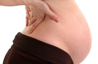 Pregnant Woman Suffering from Back Pain