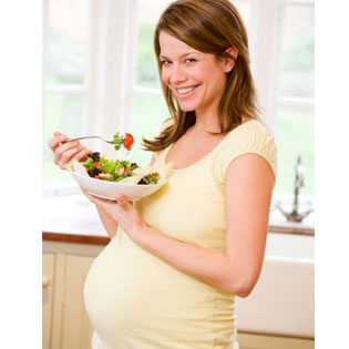 Pregnant woman eating healthy