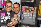 Elton John and David Furnish with son