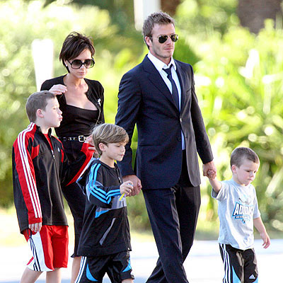 Victoria and David Beckham with children