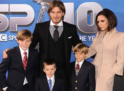 Victoria and David Beckham with children
