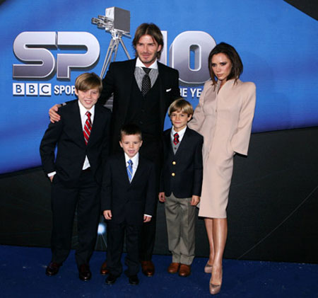 David and Victoria Beckham with children