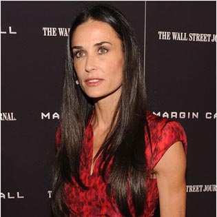 Demi Moore to Adopt a Child to Fight depression