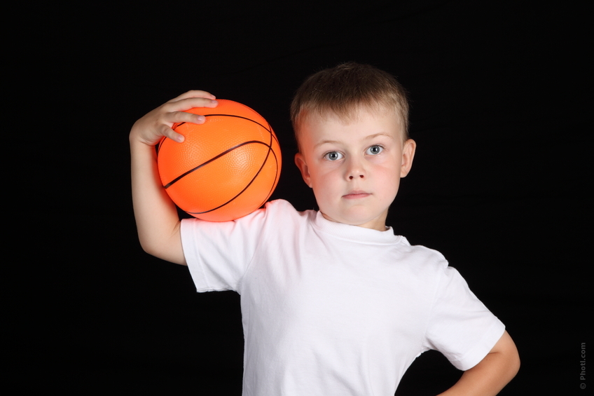 Boy holding a Ball