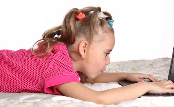 child-kid-girl-laptop-gadget-posture-spine-bed