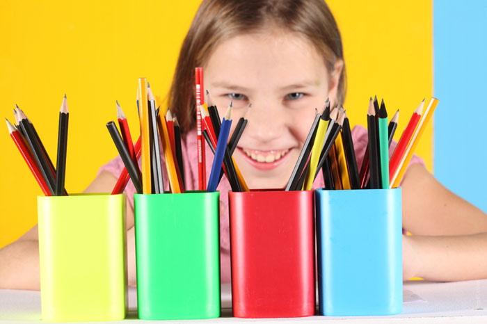700-hirl-child-school-pencils-smile
